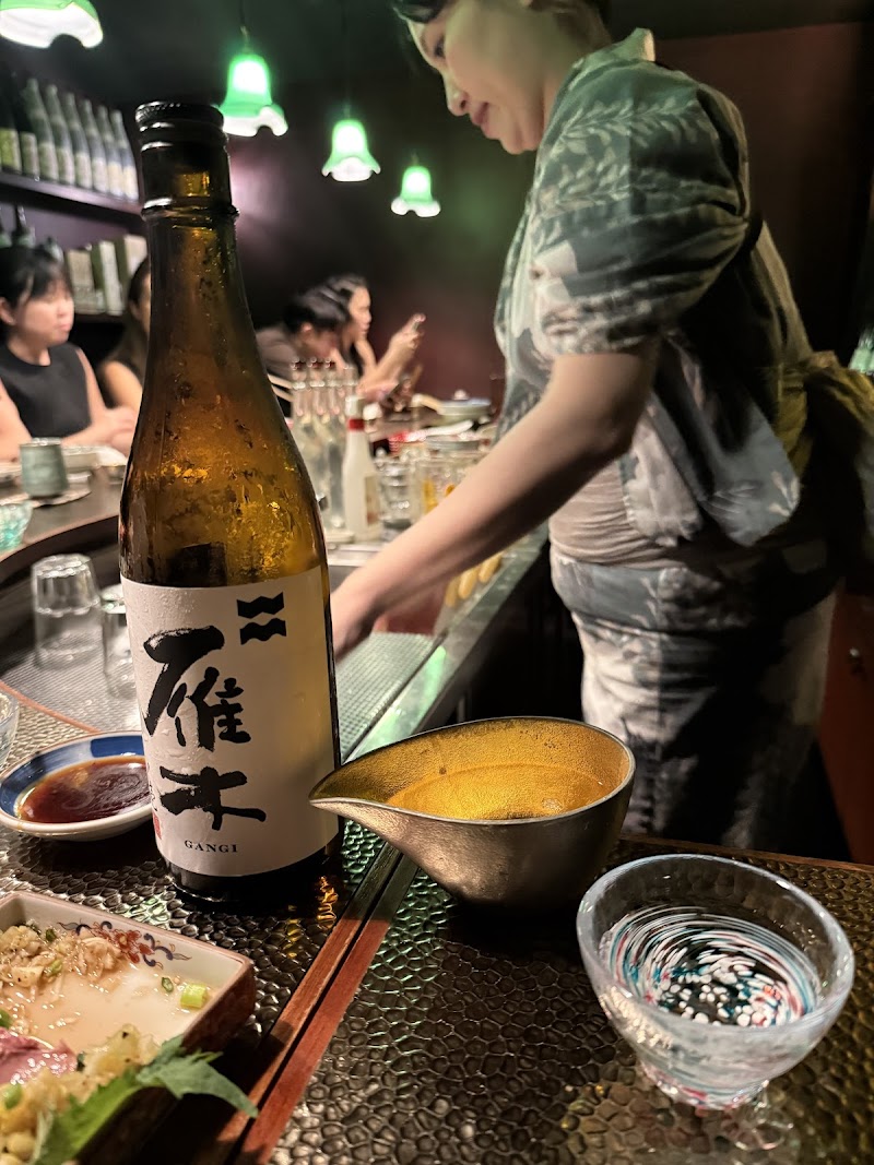 Apollon sake bar counter with draft sake taps at Orchard Plaza