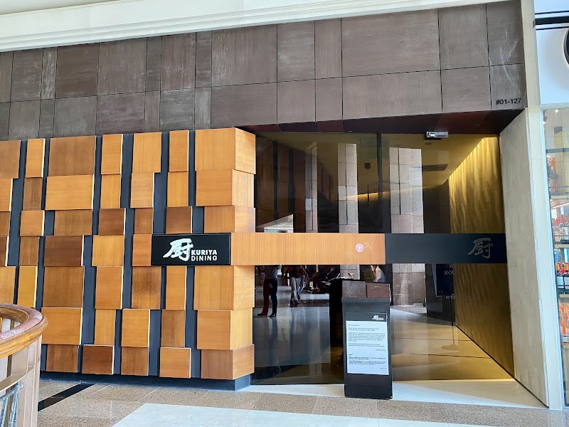 Kuriya Dining seasonal kaiseki — artisan crockery presentation