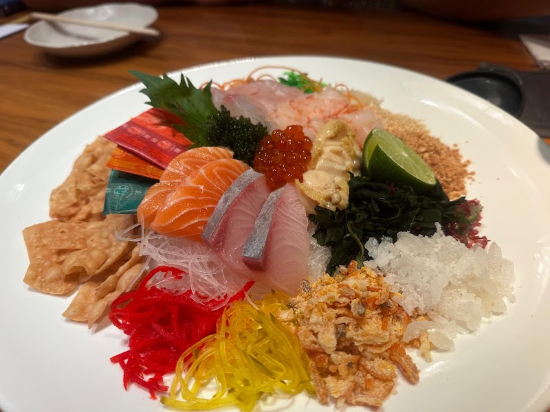 Drawer-style bento presentation at Kuriya Dining