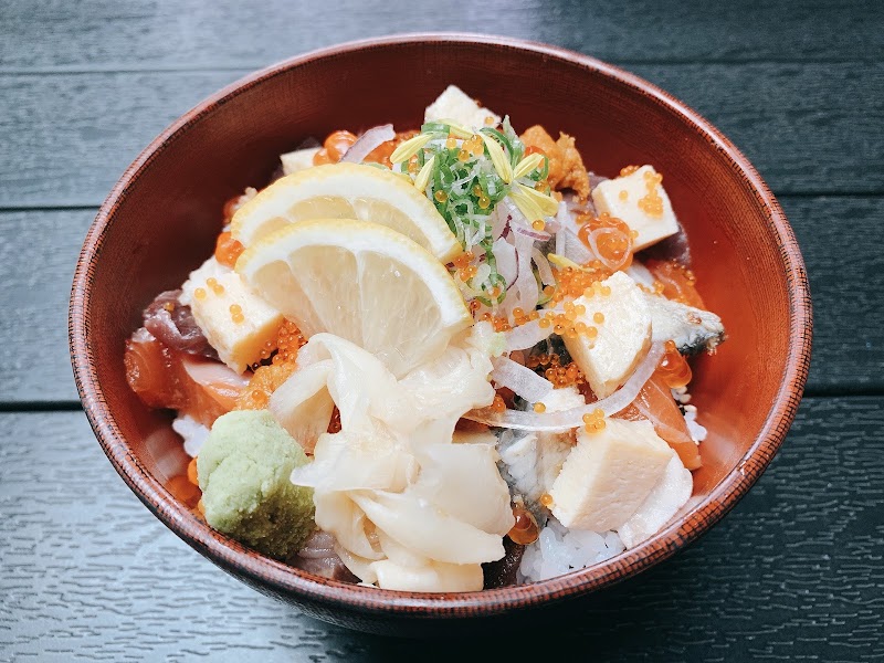 TEN Sushi counter chef preparing nigiri