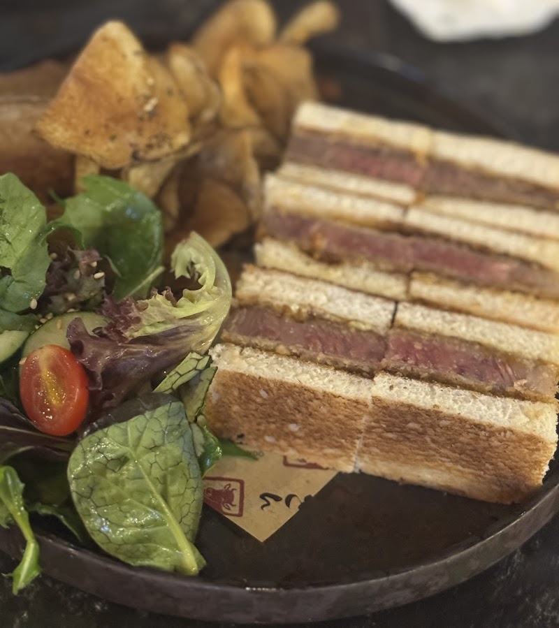 Sukiyaki with egg and truffle