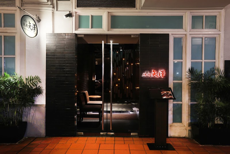 Yazawa A5 wagyu marbling on grill